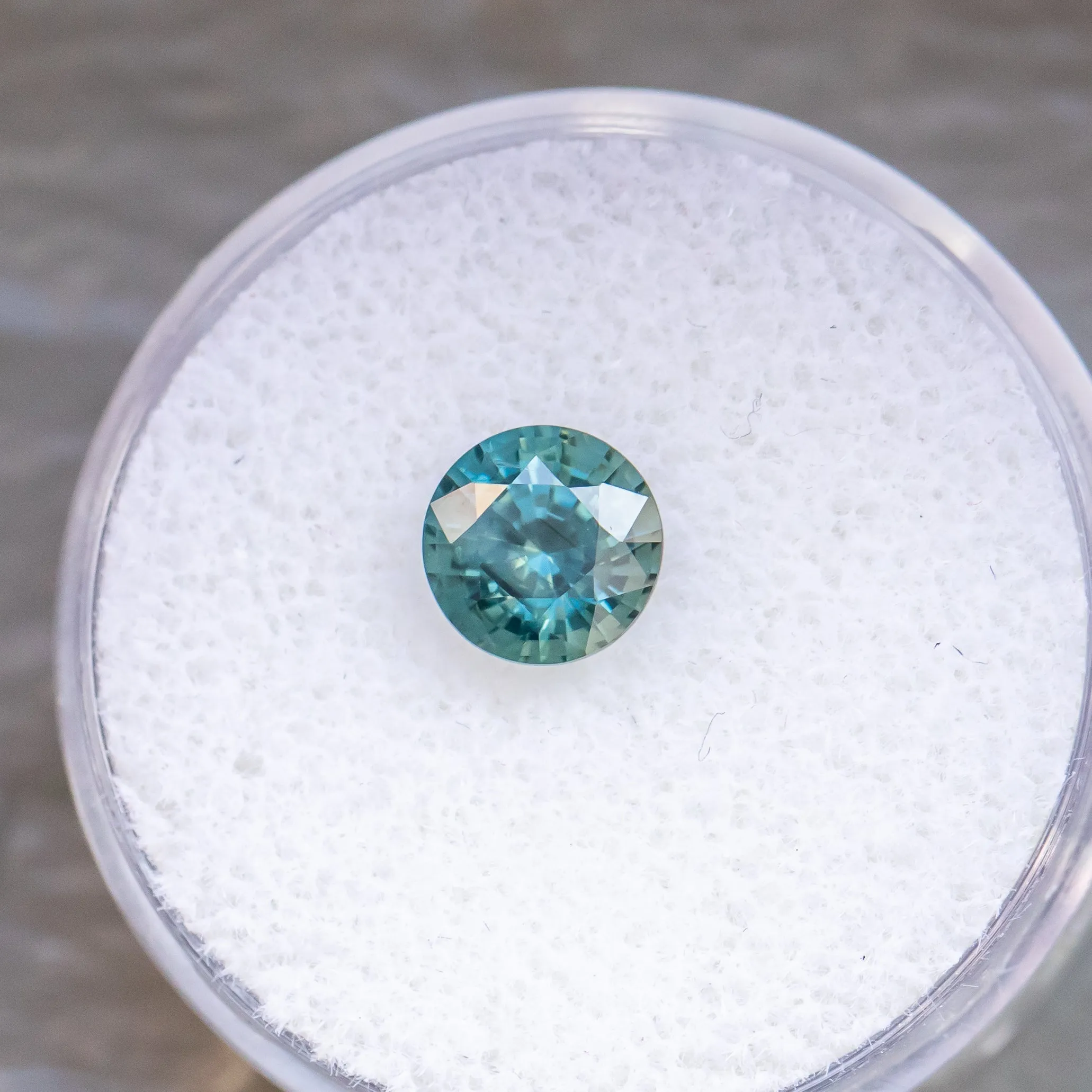 1.55CT ROUND MADAGASCAR SAPPHIRE, BRIGHT MEDIUM TEAL, 6.53X4.72MM