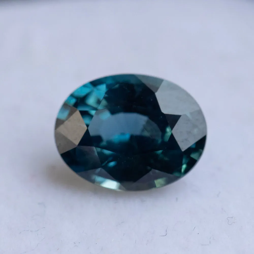 2.56CT OVAL MADAGASCAR SAPPHIRE, DEEP TEAL, 9X7X4.5MM, UNTREATED