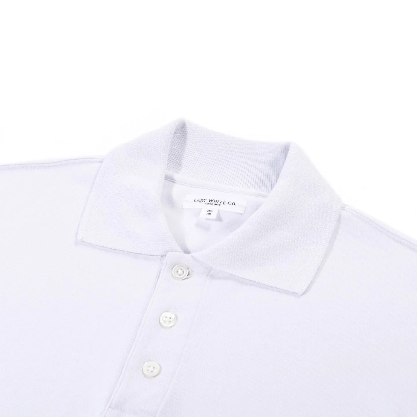 LADY WHITE CO. THREE BUTTON POLO ICE