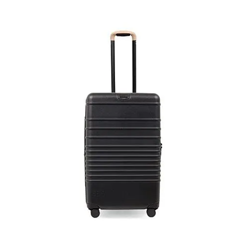 The Medium Check-In Roller in Black